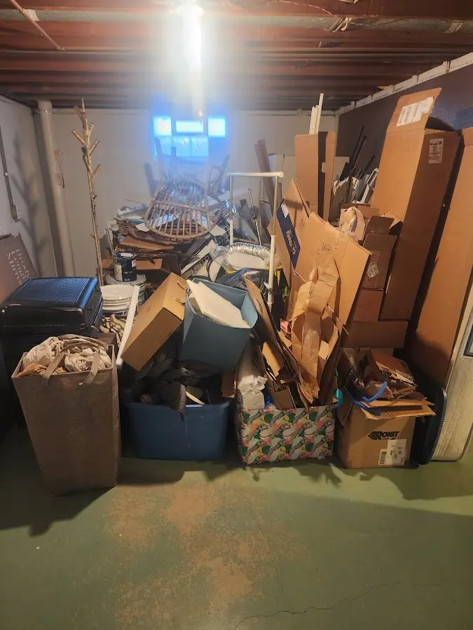 Roll-off dumpster container at job site for 2 Yard Dumpster Rental in Miramar Beach